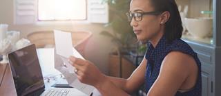 Woman working on her finances. 